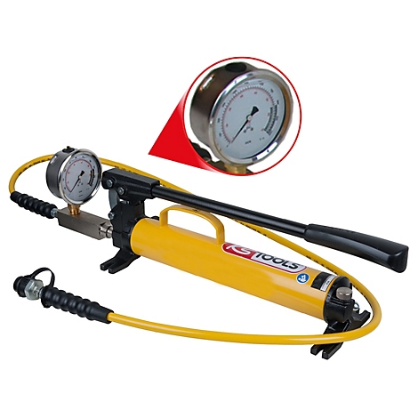 Gelbe Hydraulikpumpe mit Manometern, schwarzem Griff und gelbem Schlauch. Detailansicht des Manometers.